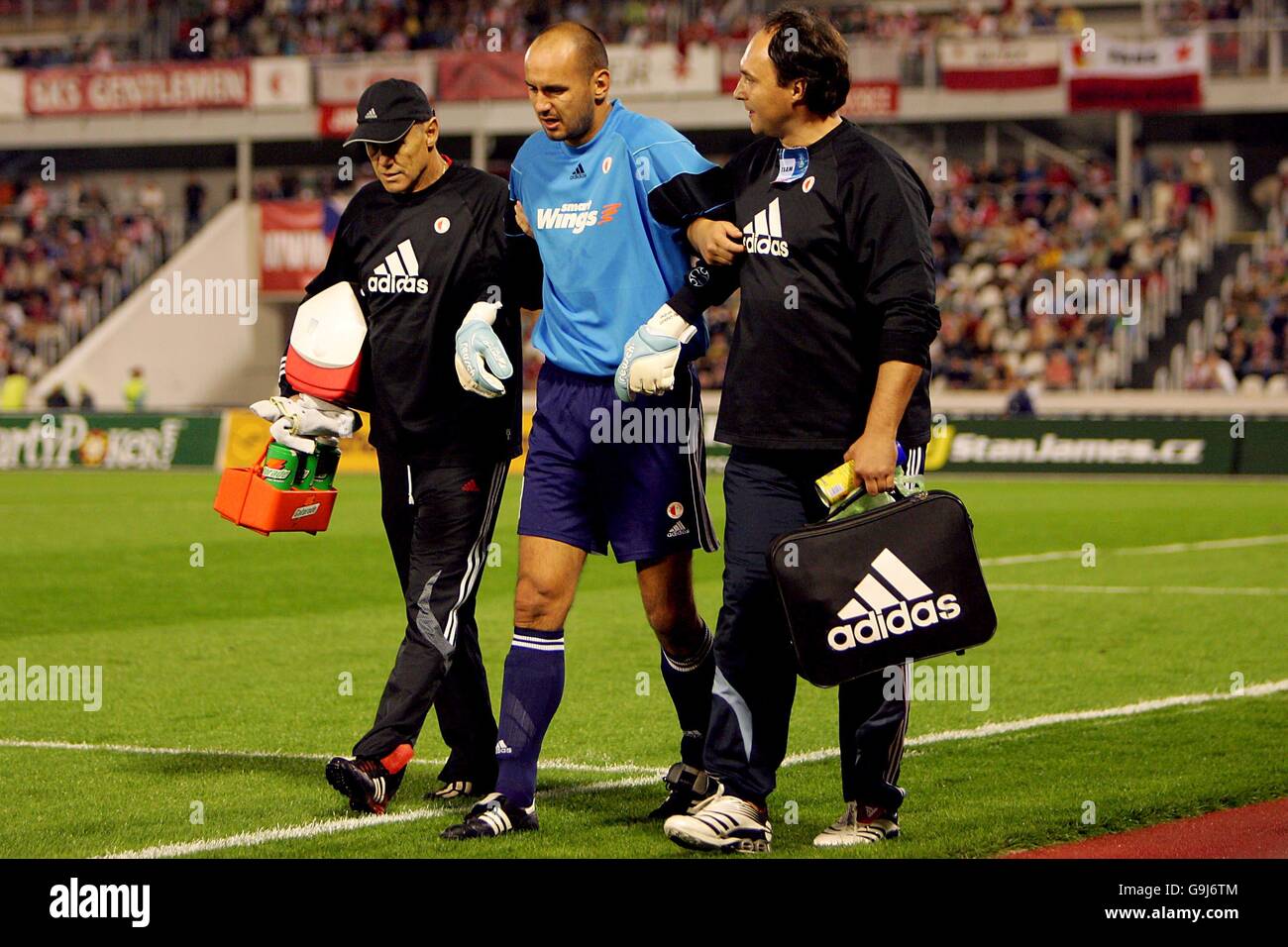 Slavia Prague's goalkeeper M Vorel is taken off injured Stock Photo
