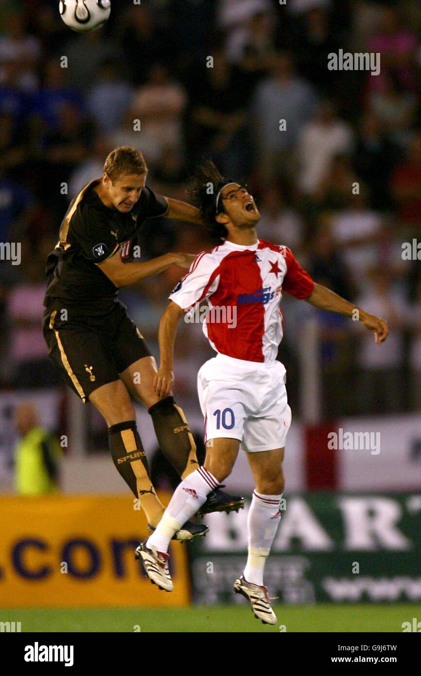 Tottenham Hotspur's Michael Dawson and Slavia Prague's Rogerio Gaucho battle for the ball Stock Photo