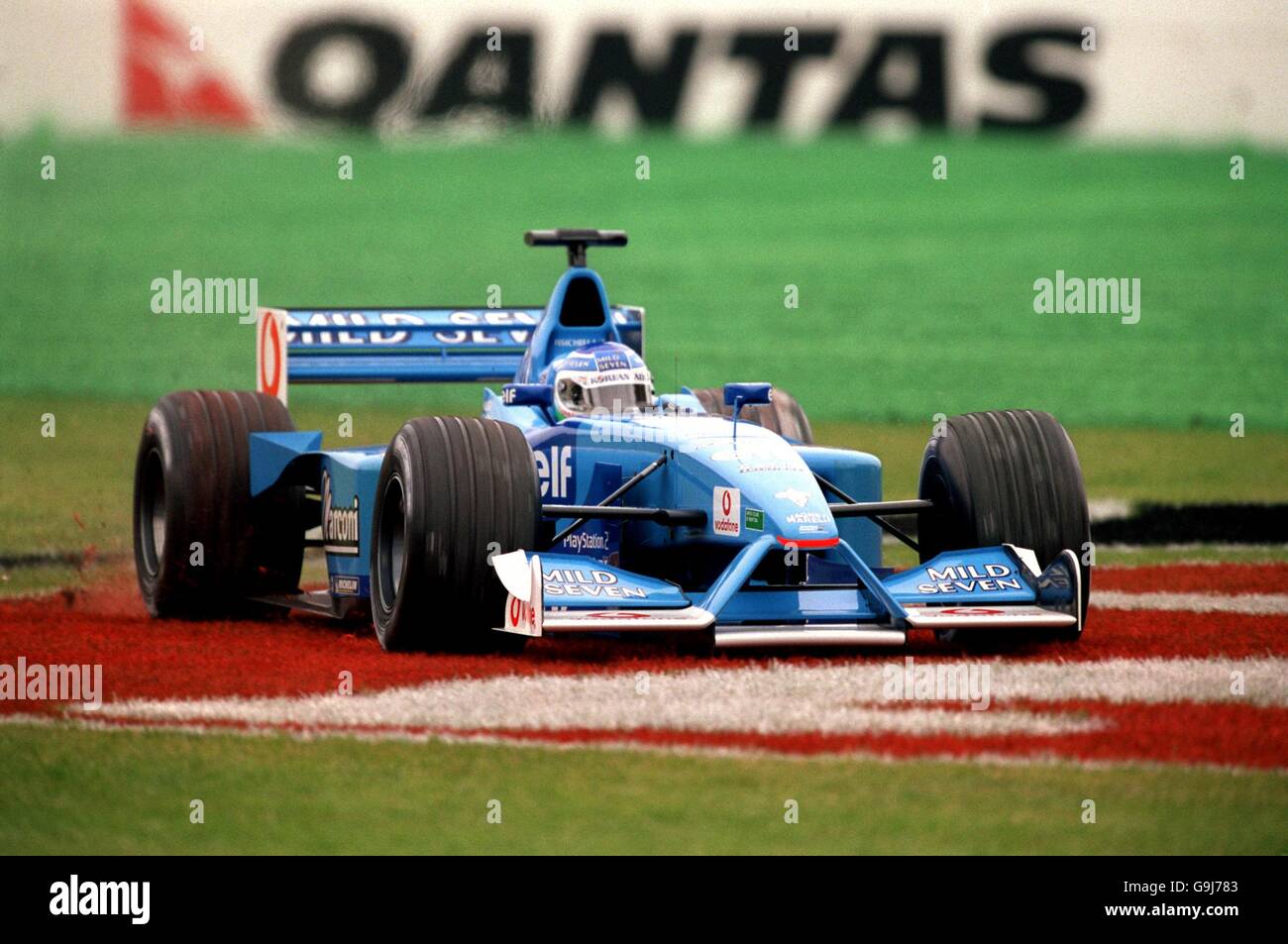 Formula One Motor Racing - Australian Grand Prix - Qualifying. Benetton's  Giancarlo Fisichella takes a short cut across the grass Stock Photo - Alamy