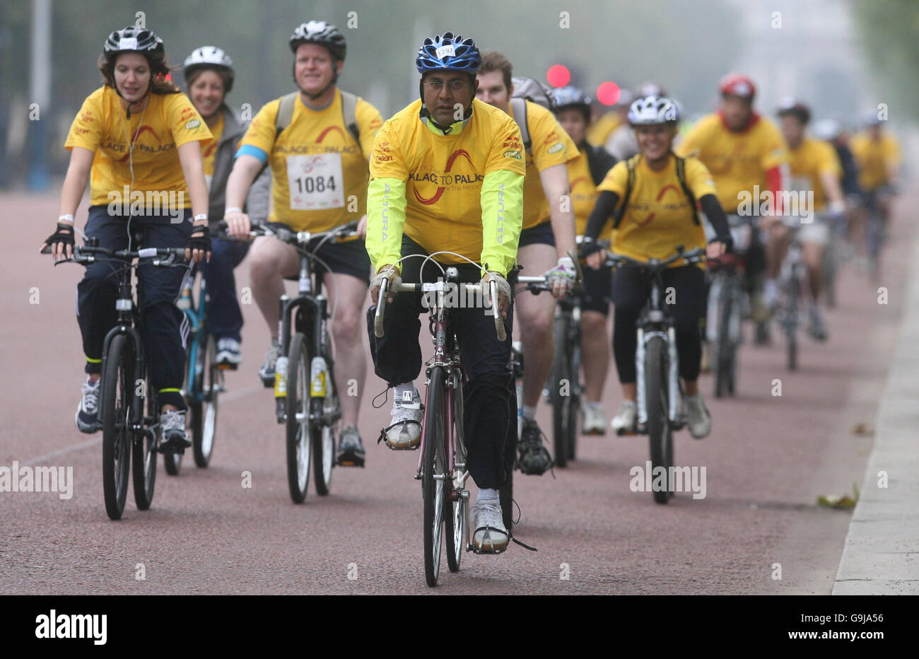 Cyclsts ride along the Mall, from Buckingham Palace, during the inaugural Palace to Palace