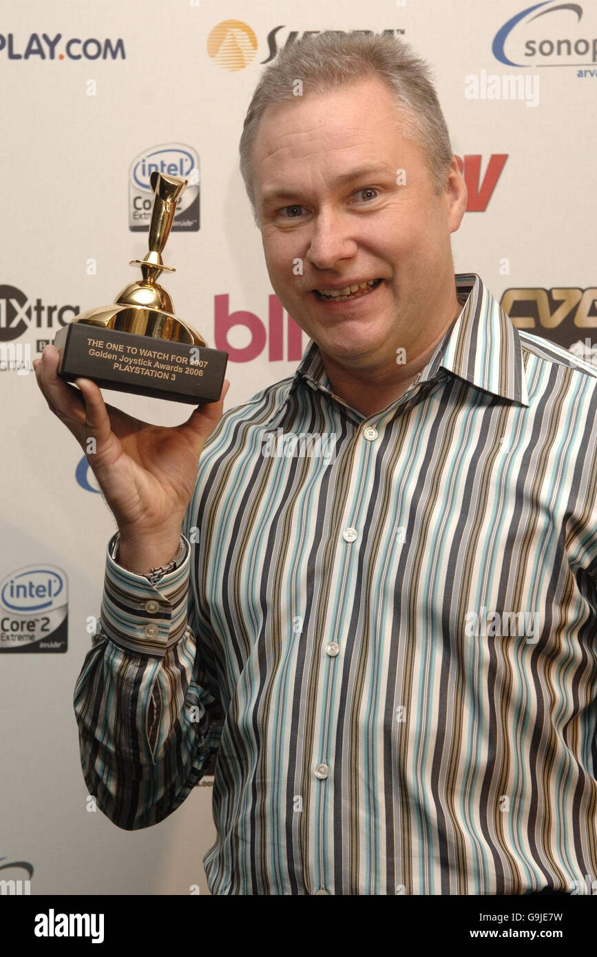 Ray Maguire from Sony UK with the award for The One to Watch for Playstation 3, at the 24th Golden Joystick Awards at The London Hilton Hotel on Park Lane in central London. Stock Photo