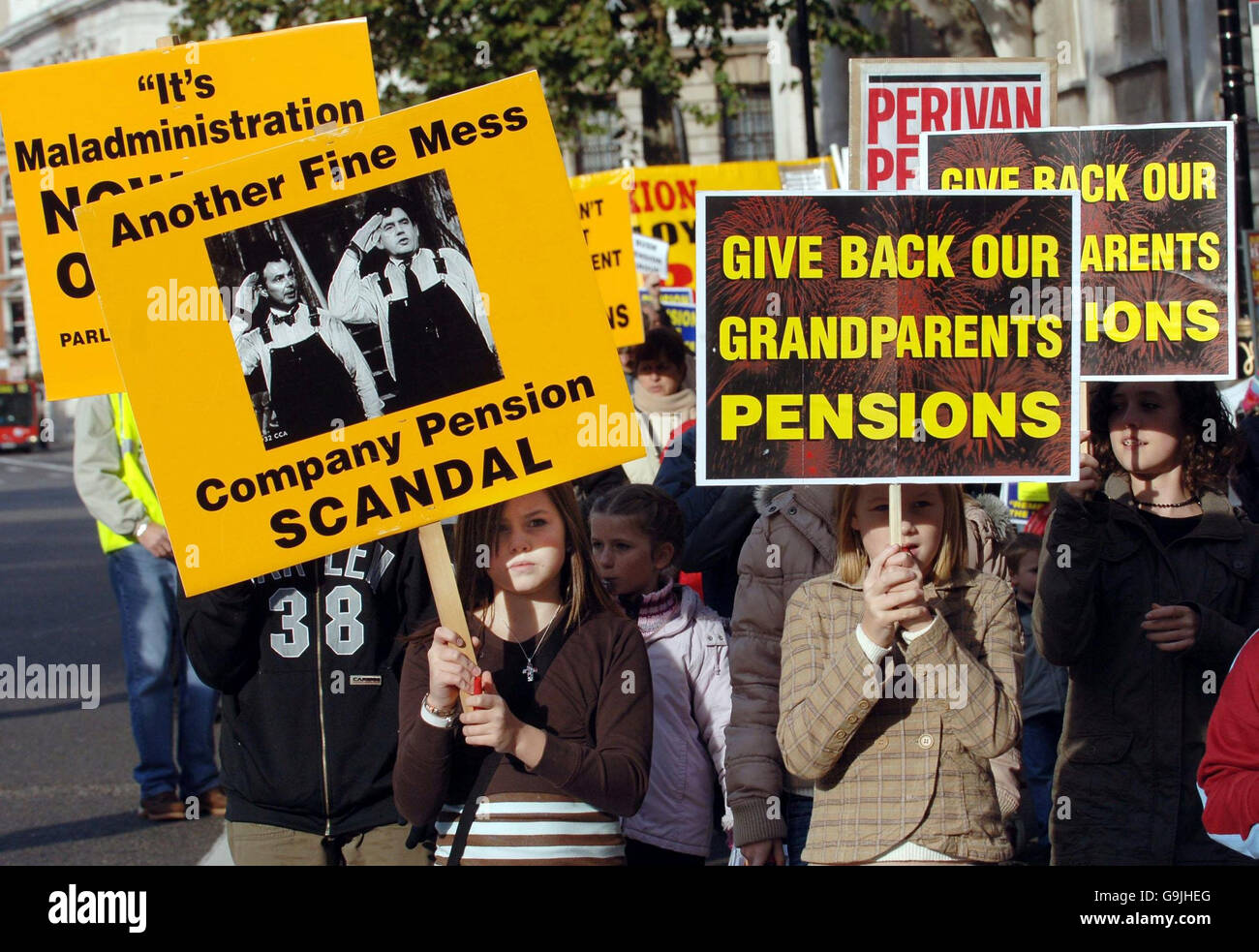 Children and grandchildren of pensioners who have lost their life savings in collapsed pension funds protest through Westminster, London. Stock Photo