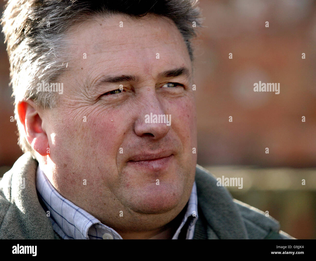 Racing Horses parade Manor Farm Stables. Paul Nicholls speaks to