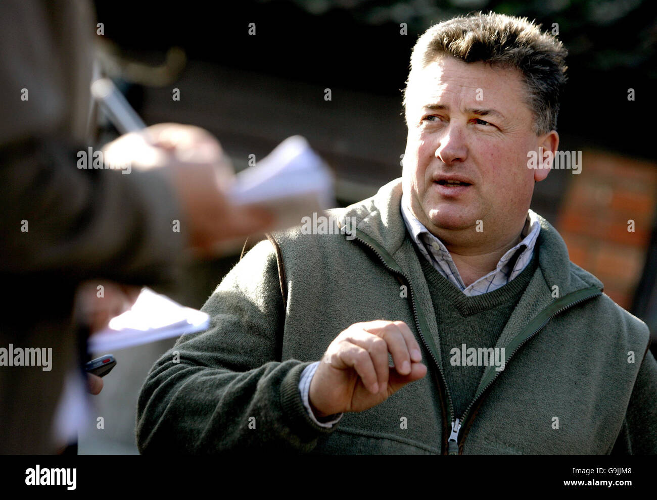 Paul Nicholls speaks to the press after he paraded his horse Kauto Star