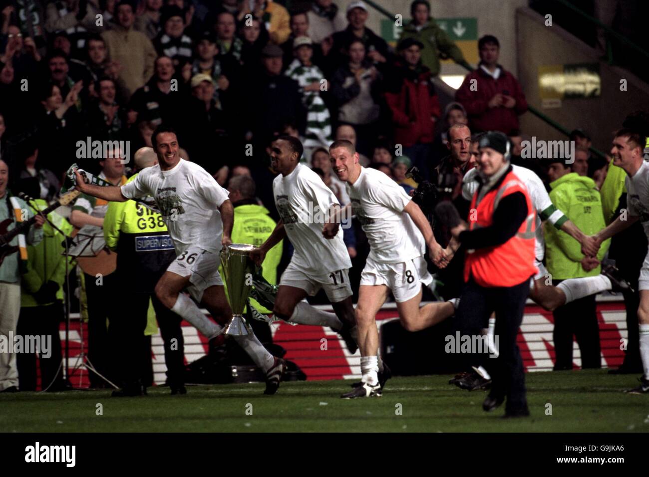 Celtic’s Ramon Vega, Didier Agathe and Alan Thompson celebrate with the