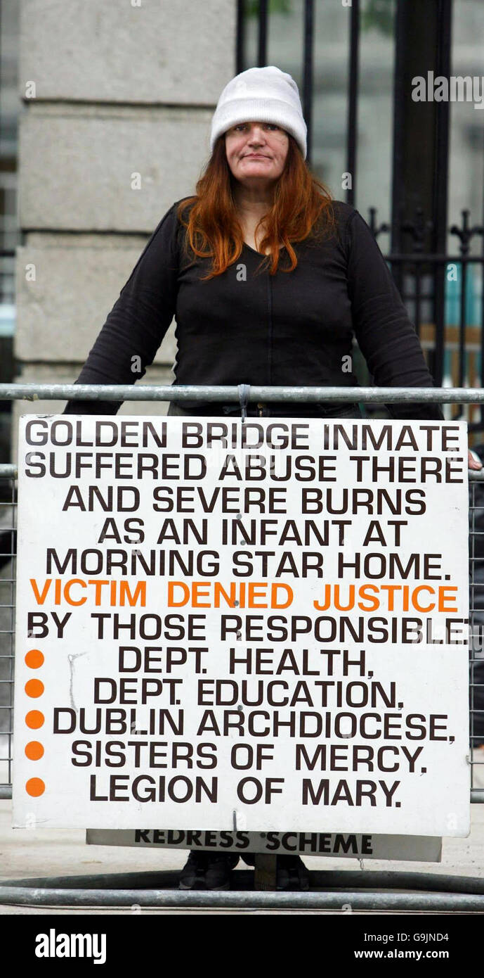 Marie Terese O' Loughlin protests outside the Dail, Dublin, as she has done for 365 days, to have her case for clerical abuse recognised by the Government. Stock Photo