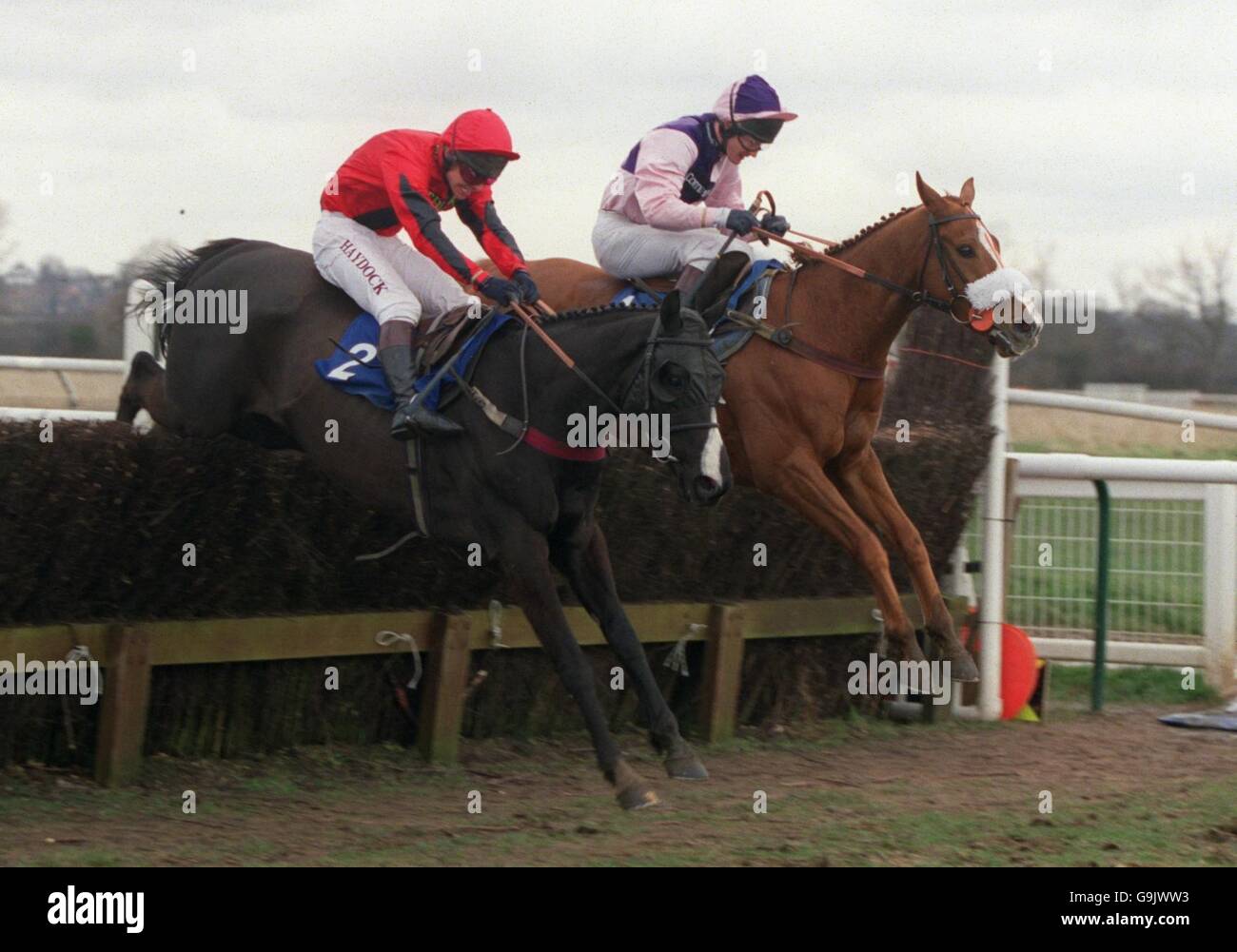 Wave Rock (no2) ridden by Richard Johnson jumps the last but can only finish second to Exit Wave (far side) ridden by Norman Williamson Stock Photo