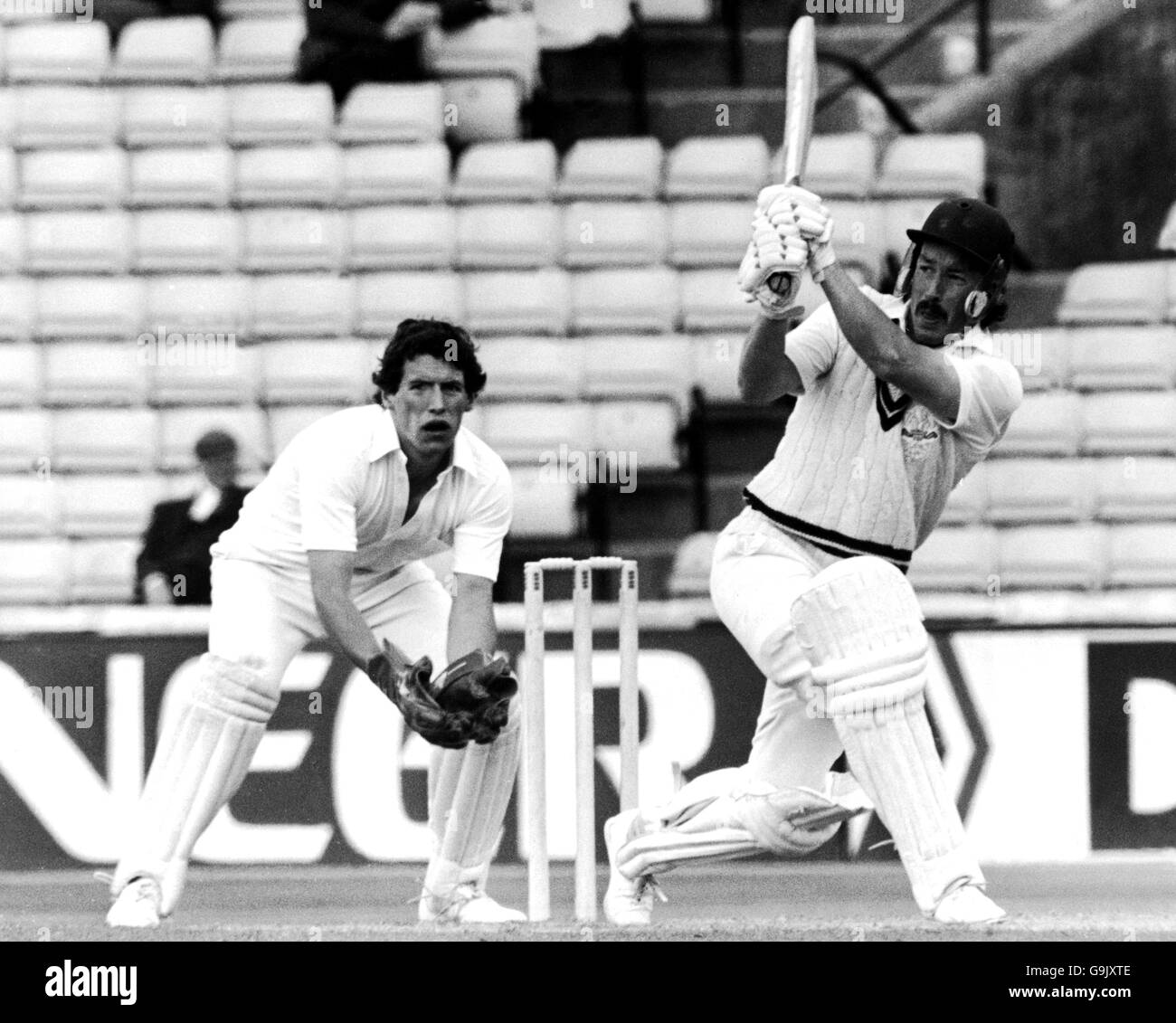 Cricket - Benson and Hedges Cup - Surrey v Essex. Surrey's Graham Clinton (r) hits another four on his way to a score of 79 Stock Photo