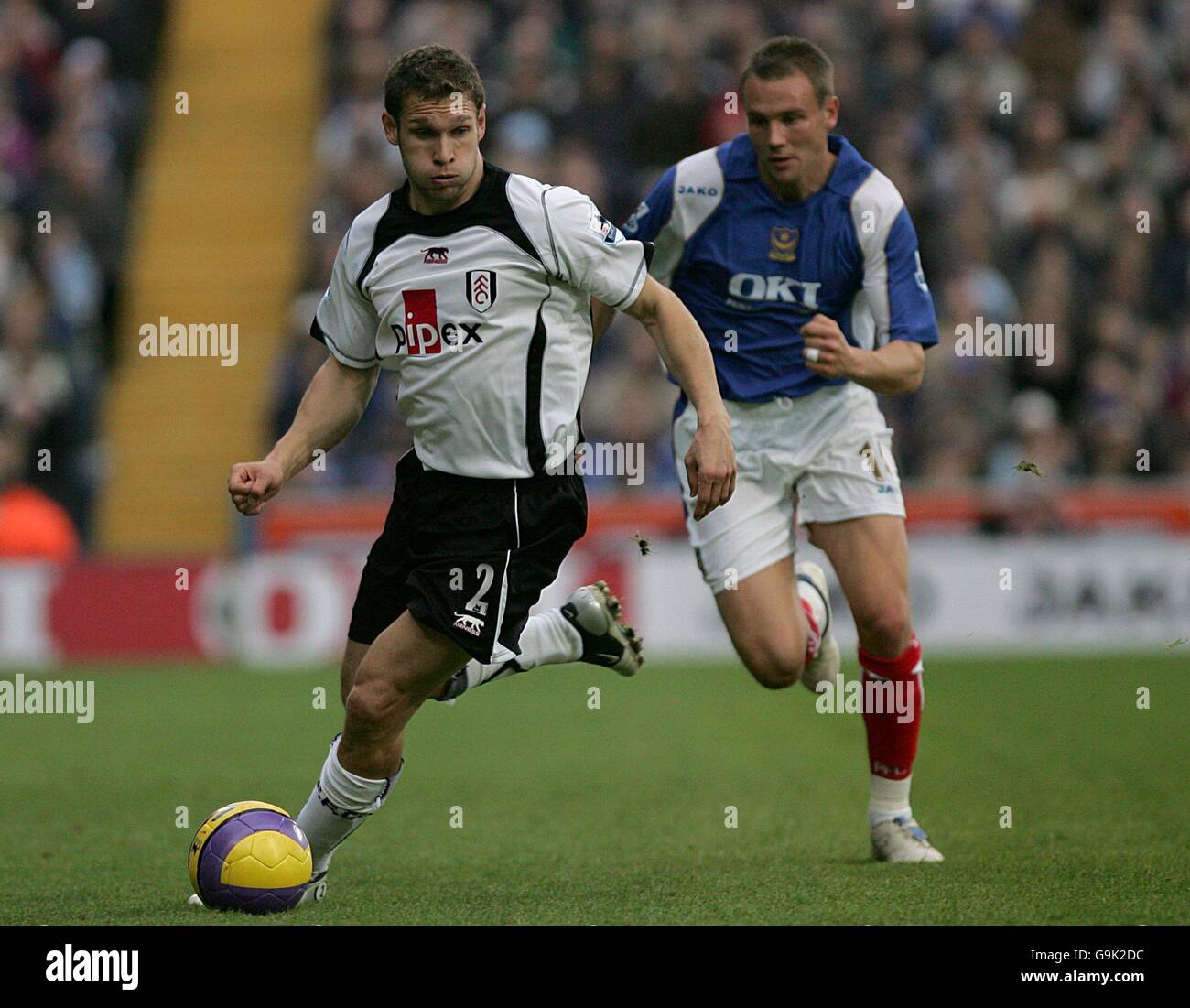 Portsmouth's Matthew Taylor and Fulham's Moritz Volz battle for the ball Stock Photo