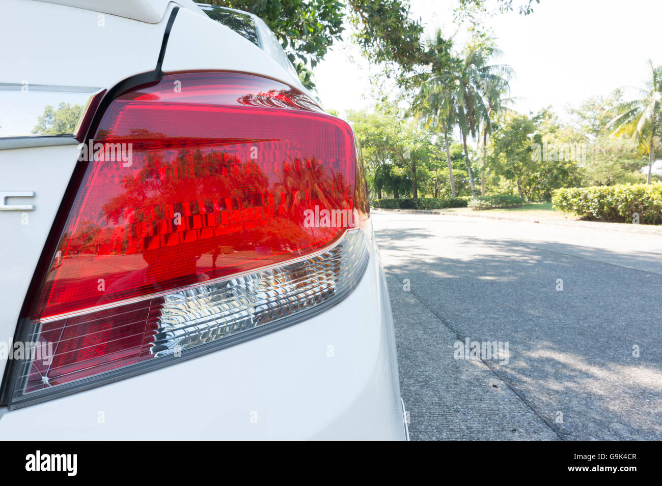 Close - up light car on the road Stock Photo