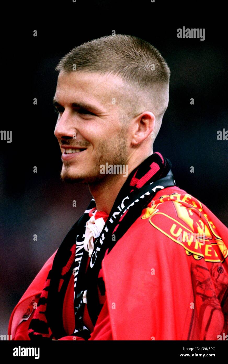 David beckham haircut hi-res stock photography and images - Page 2 - Alamy