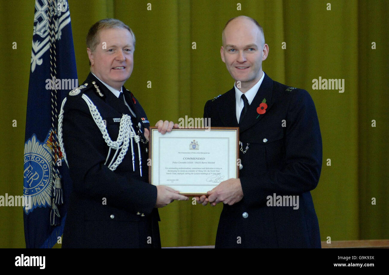 Barrie Mitchell receives his award from Met Police Commissioner Sir Ian Blair at the Metropolitan Police Service Commissioner Commendation Ceremony held at Peel Centre in Hendon, North London. Stock Photo