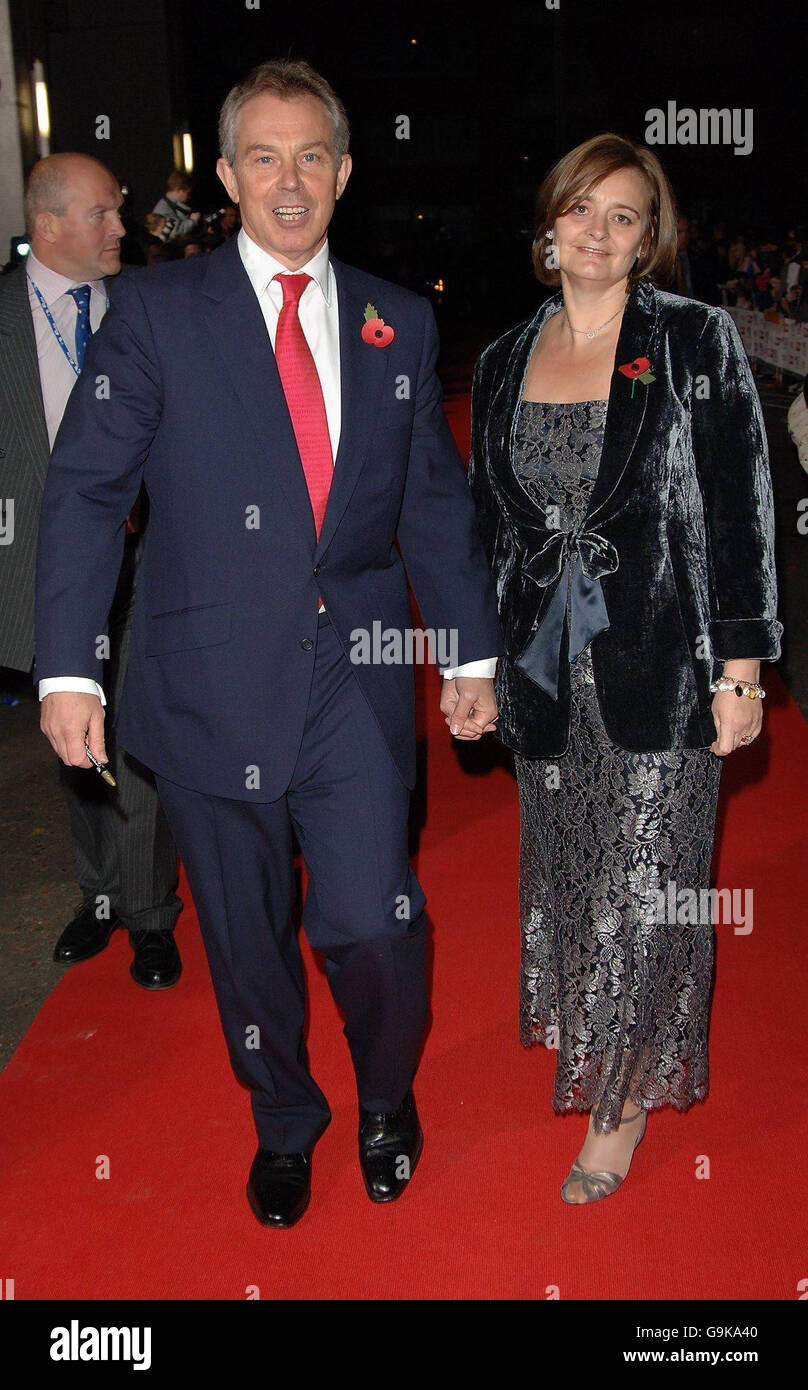 British Prime Minister Tony Blair and his wife Cherie Blair arrive for