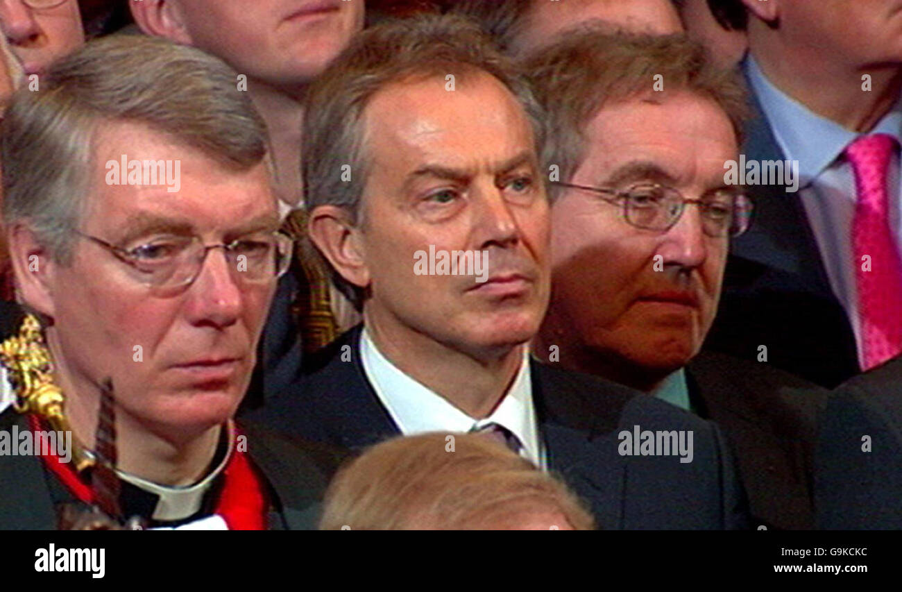 RETRANSMITTED - IMAGE AMENDED TO CORRECT WIDESCREEN DISTORTION. British Prime Minister Tony Blair (centre) listens to the Queen's Speech at the State opening of Parliament in the House of Lords, London. Stock Photo