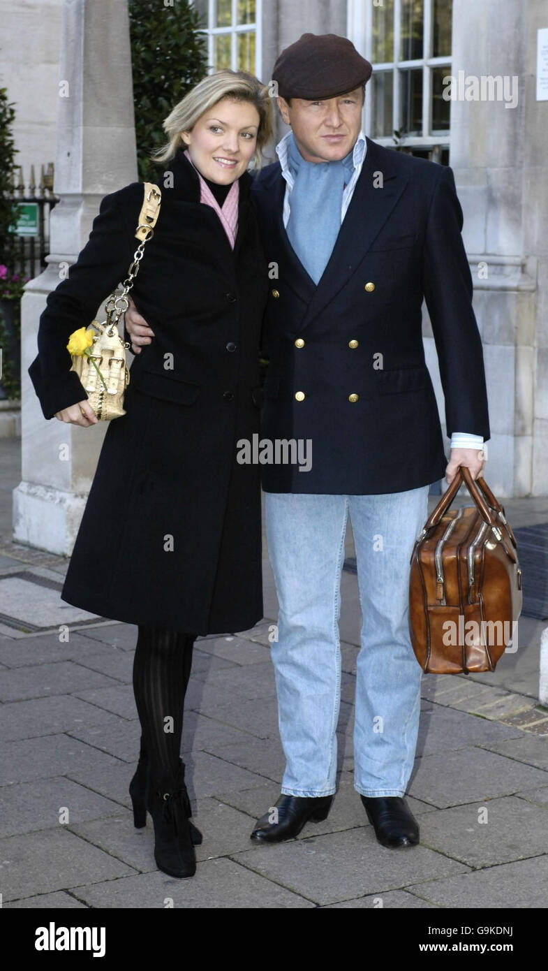 Dancer Michael Flatley leaves hospital in central London with his wife Niamh O'Brien today. The star has been receiving treatment in hospital for a serious illness, thought to be a possible viral infection, for almost a fortnight. Stock Photo