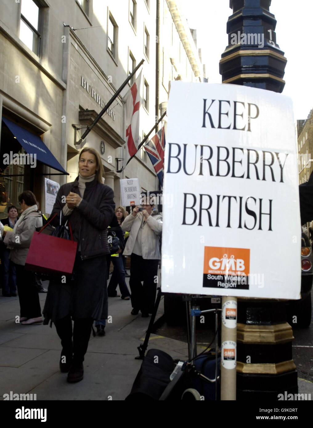 Bond Street shoppers pass workers from Burberry's factory in Wales ...