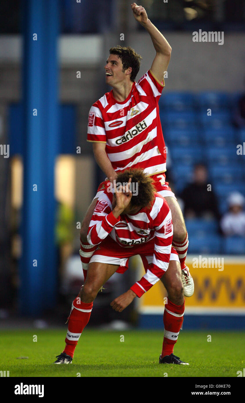 Doncaster Rovers' Jason Price celebrates his goal against Millwall, with team-mate Lewis Guy during the Coca-Cola League One match at the New Den, Millwall. Stock Photo