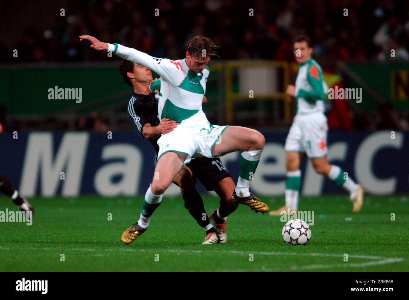 Chelsea's Michael Ballack battles for possession of the ball with Werder Bremen's Tim Borowski Stock Photo