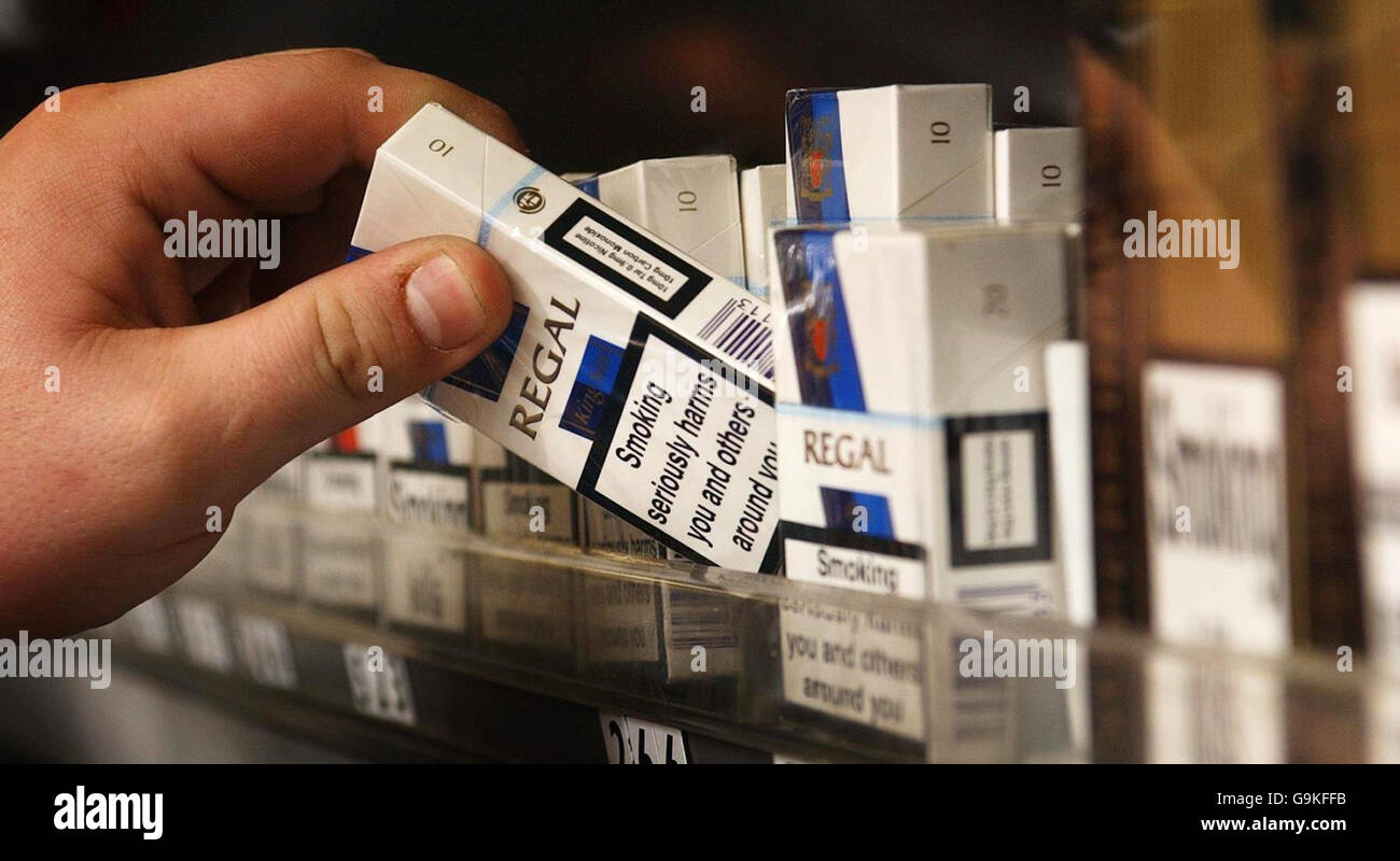 how much is a packet of cigarettes in scotland A shop assistant reaches for a packet of cigarettes in a Glasgow shop,  after plans to raise the legal age for buying cigarettes to 18 in Scotland  were unveiled yesterday Stock Photo -