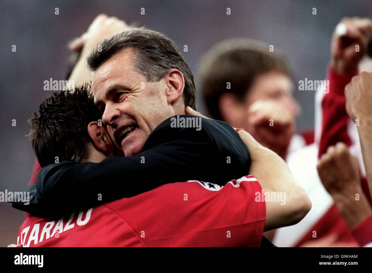 Soccer - UEFA Champions League - Final - Bayern Munich V Valencia. Bayern Munich Coach Ottmar Hitzfeld (r) hugs Bixente Lizarazu (l) after the game was won on penalties Stock Photo