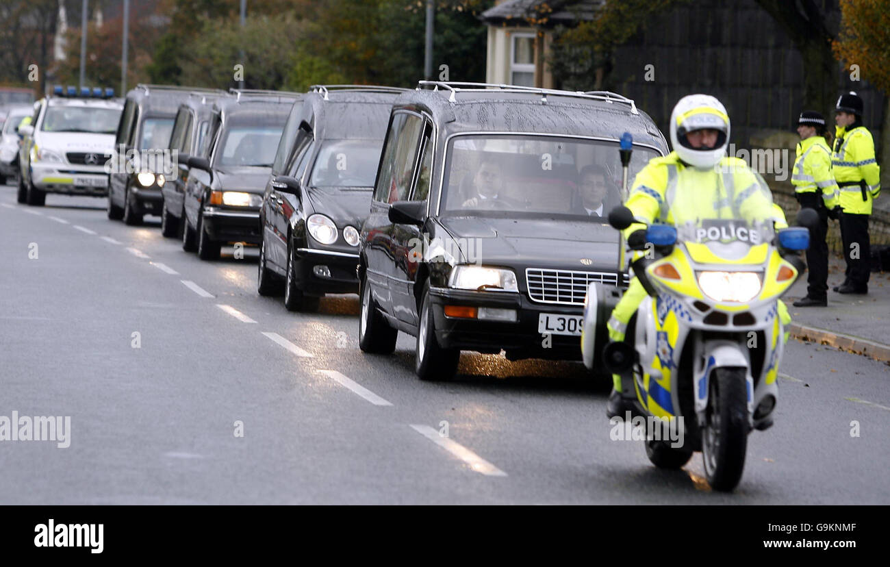 The hearses carrying the bodies of five members of the same family ...