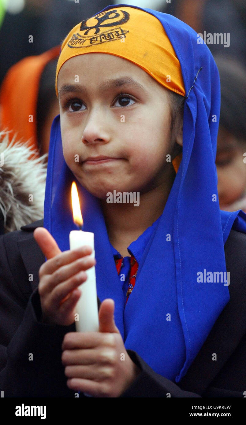 Sharan Kaur, nine, takes part in a prayer vigil at Pilrig Park in Edinburgh, where a Sikh teenager's hair was hacked off during a racial attack last Tuesday evening. Stock Photo