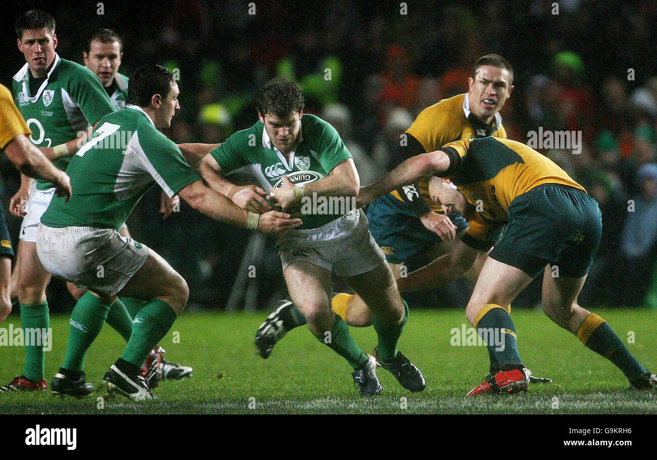 Ireland's Gordon D'Arcy evades Austrailia's captain Sterling Mortlock during the International match at Lansdowne Road, Dublin, Ireland. Stock Photo