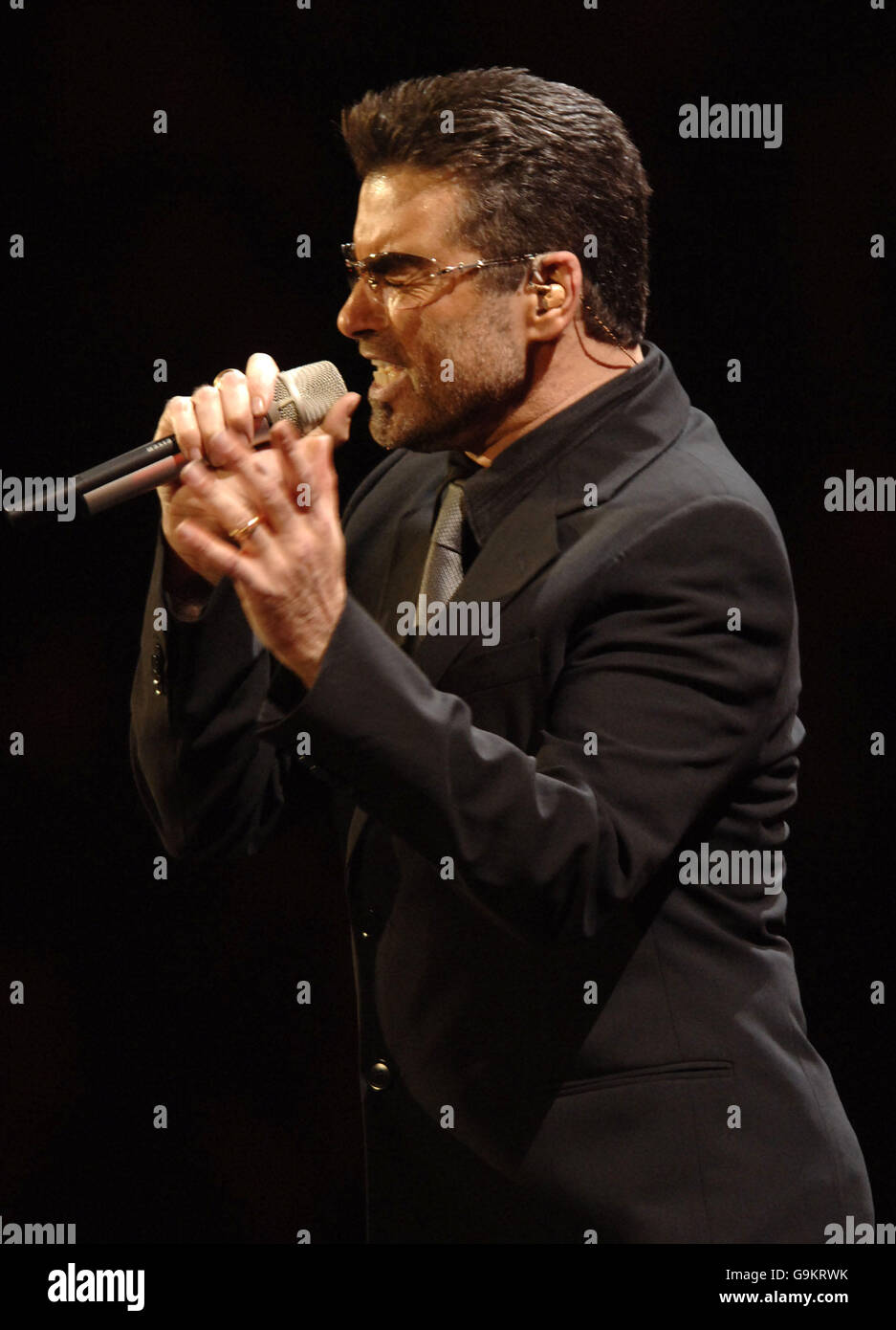 George Michael performs in Manchester. Singer George Michael performs at the MEN Arena in Manchester during his '25 Live' world tour. Stock Photo