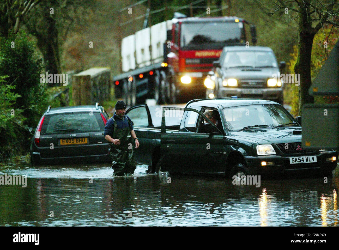 A road flooded near Moffat in the Scottish Borders stops traffic after heavy overnight storms. Stock Photo