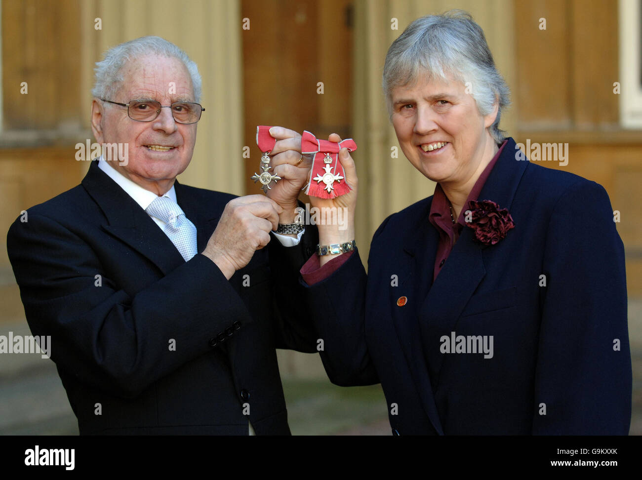 Victor Mizzi and Linda Walker, after each receiving MBE's for services to child victims of the Chernobyl disaster, in Belarus, from Queen Elizabeth II during an Investiture ceremony at Buckingham Palace, London. Stock Photo