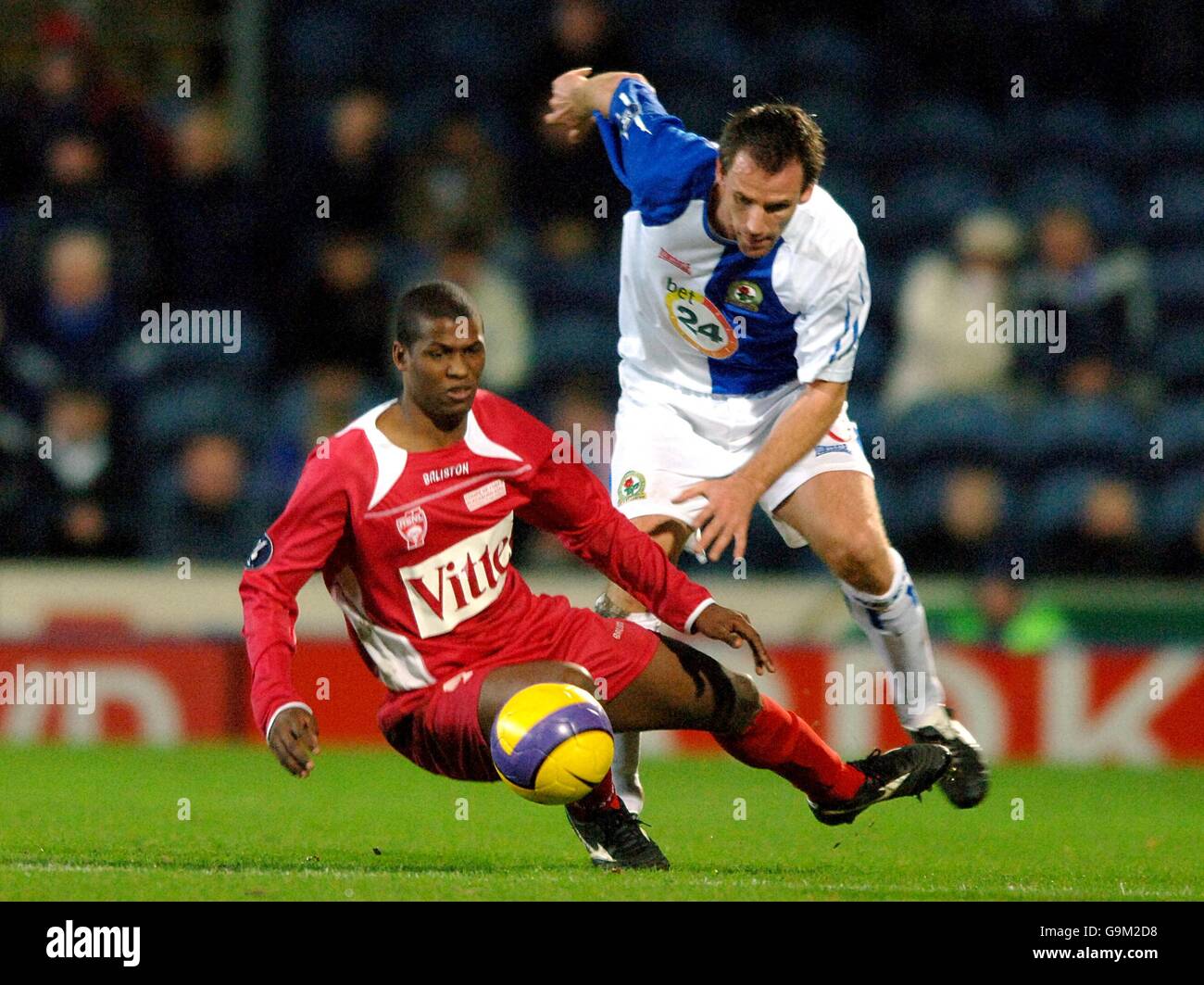 (L-R) AS Nancy's Carlos Kim and Blackburn Rovers' Andre Ooijer. Stock Photo