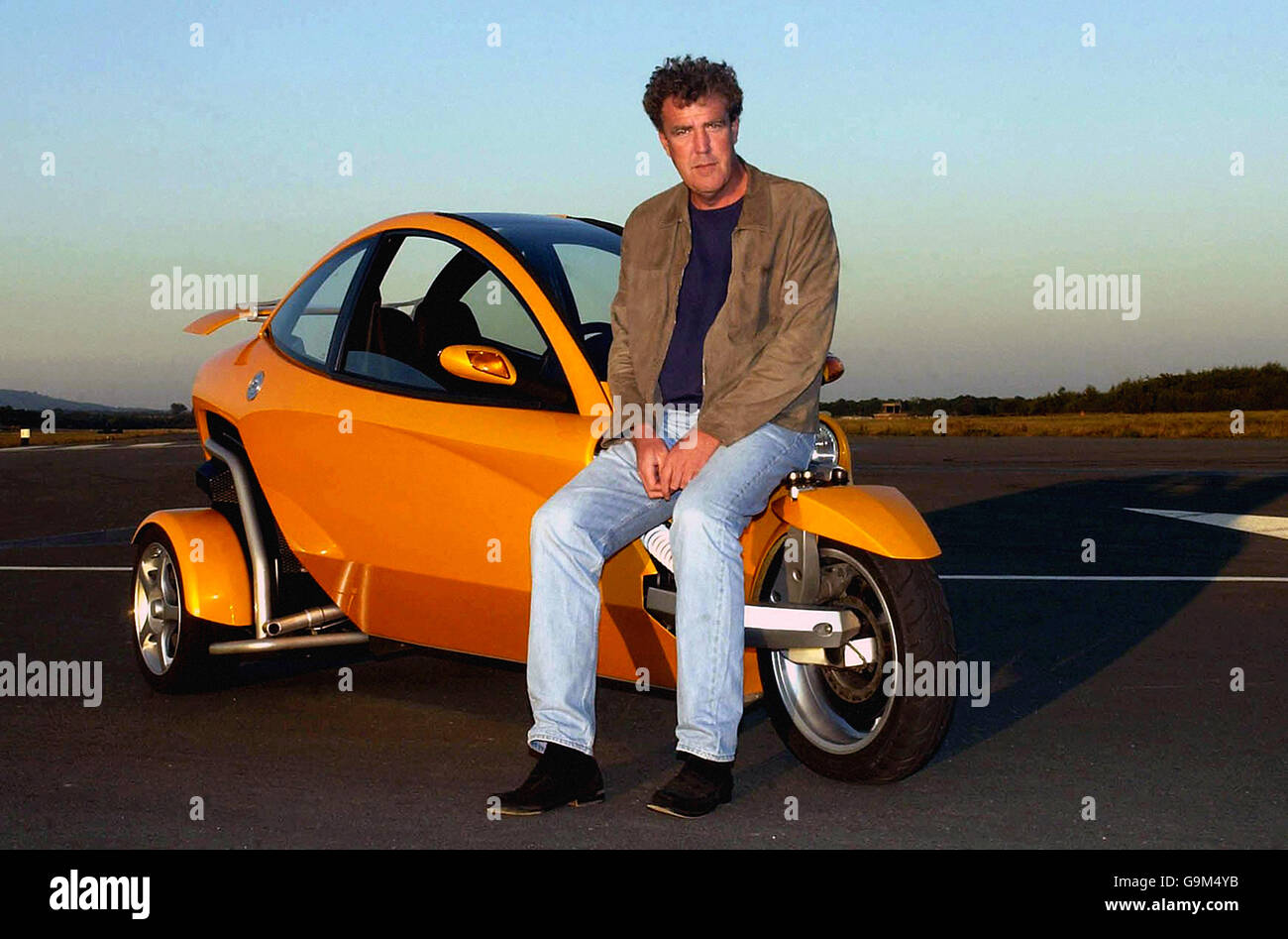 Top Gear presenter Jeremy Clarkson leans on a Carver, a tilting three