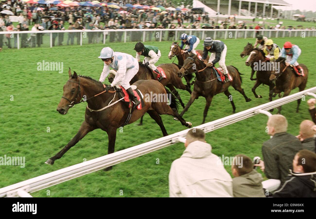 L-R; Saratov ridden by Kevin Darley comes home to win The Newton Investment Management Rated Stakes from King's Welcome ridden by P. Goode and Sweet Prospect ridden by R. Mullen Stock Photo