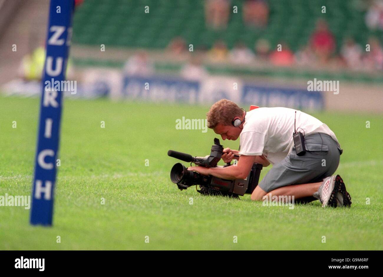 Rugby Union - Zurich Championship - Final - Leicester Tigers v Bath. A television cameraman captures the action Stock Photo