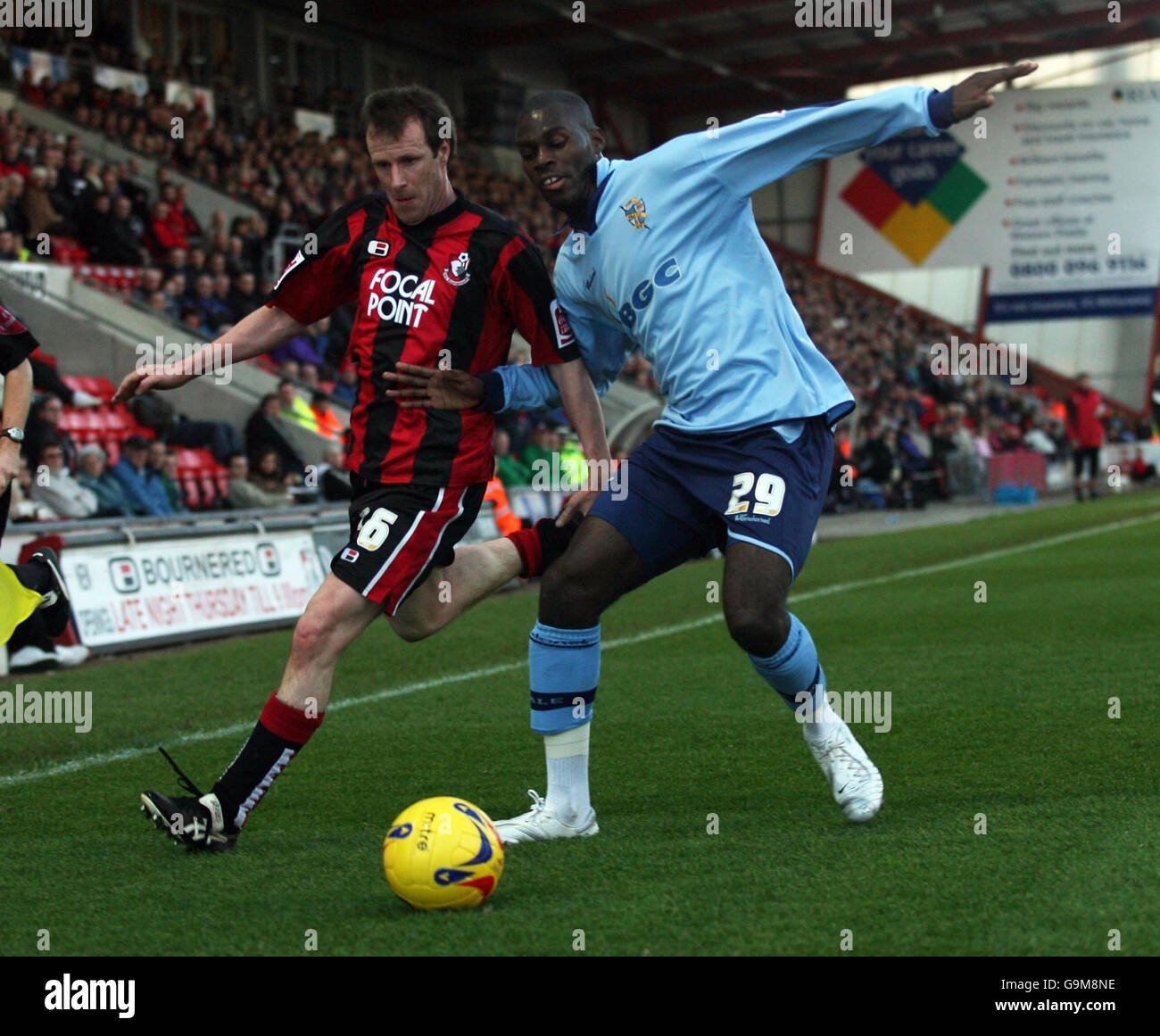 Bournemouth's Steve Claridge tussles with Port Vale's Clayton Fortune during the League One match at the Dean Court Ground, Bournemouth. Stock Photo