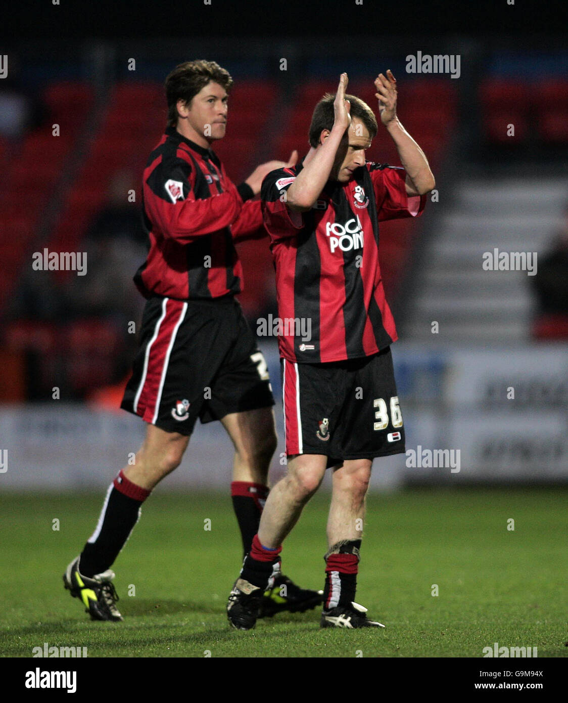 Steve Claridge is subbed during the League One match between Bournemouth and Port Vale during the League One match at the Dean Court Ground, Bournemouth. Darren Anderton claps him off. Stock Photo