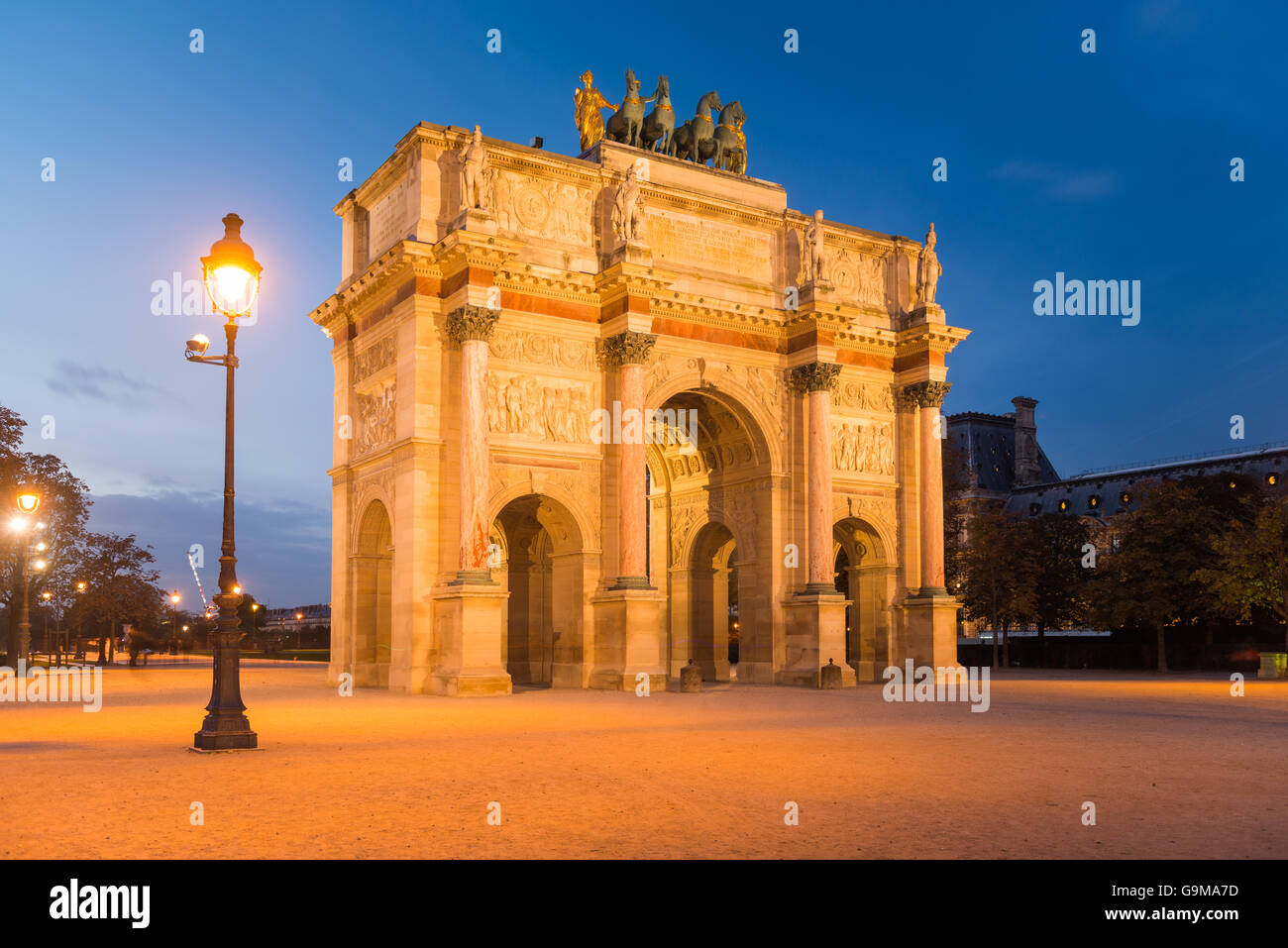 Arc de Triomphe du Carrousel on Place du Carrousel at the famous Museum Louvre Stock Photo