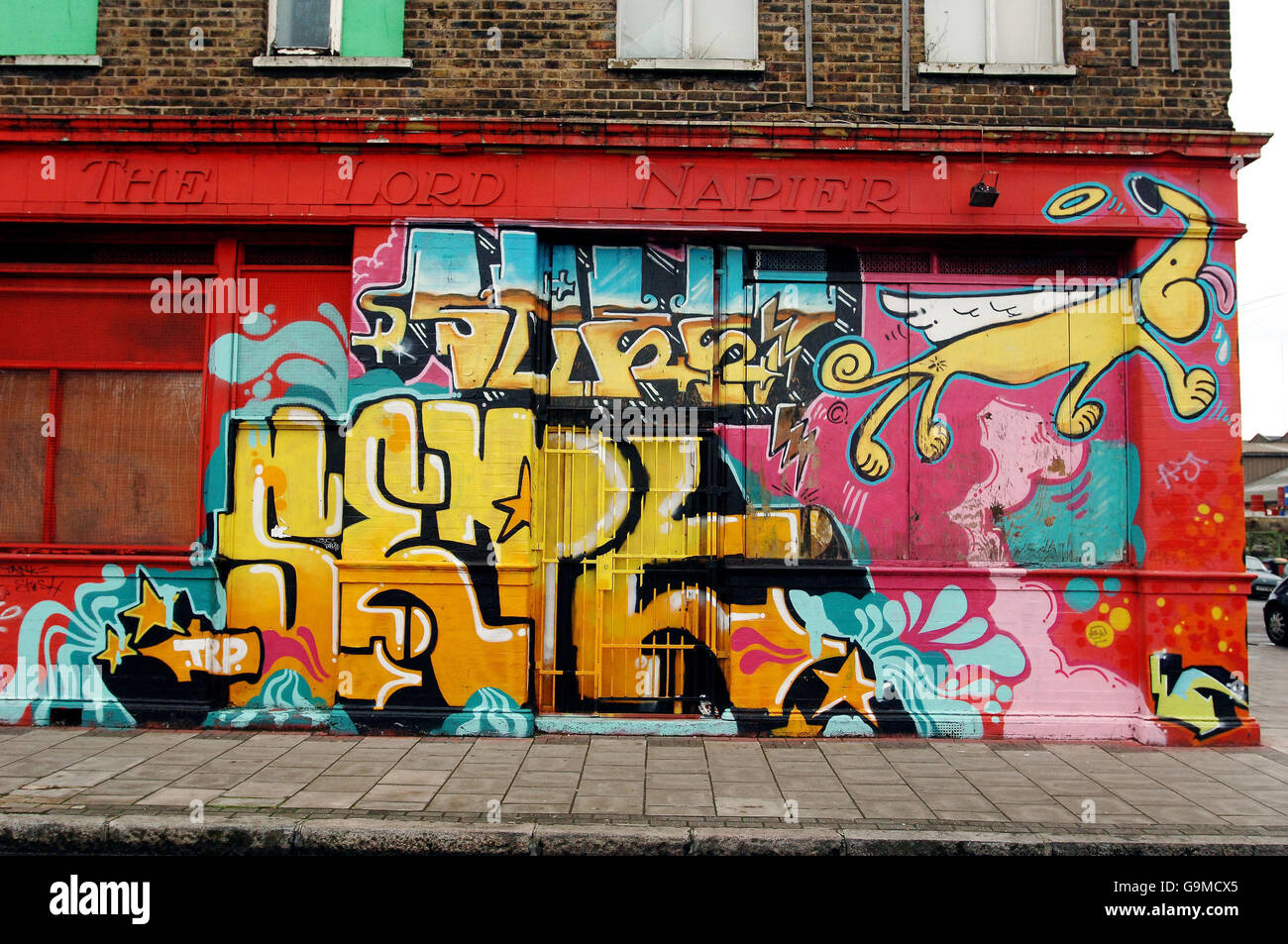 Graffiti sprayed on a pub in Hackney Wick, east London. Stock Photo