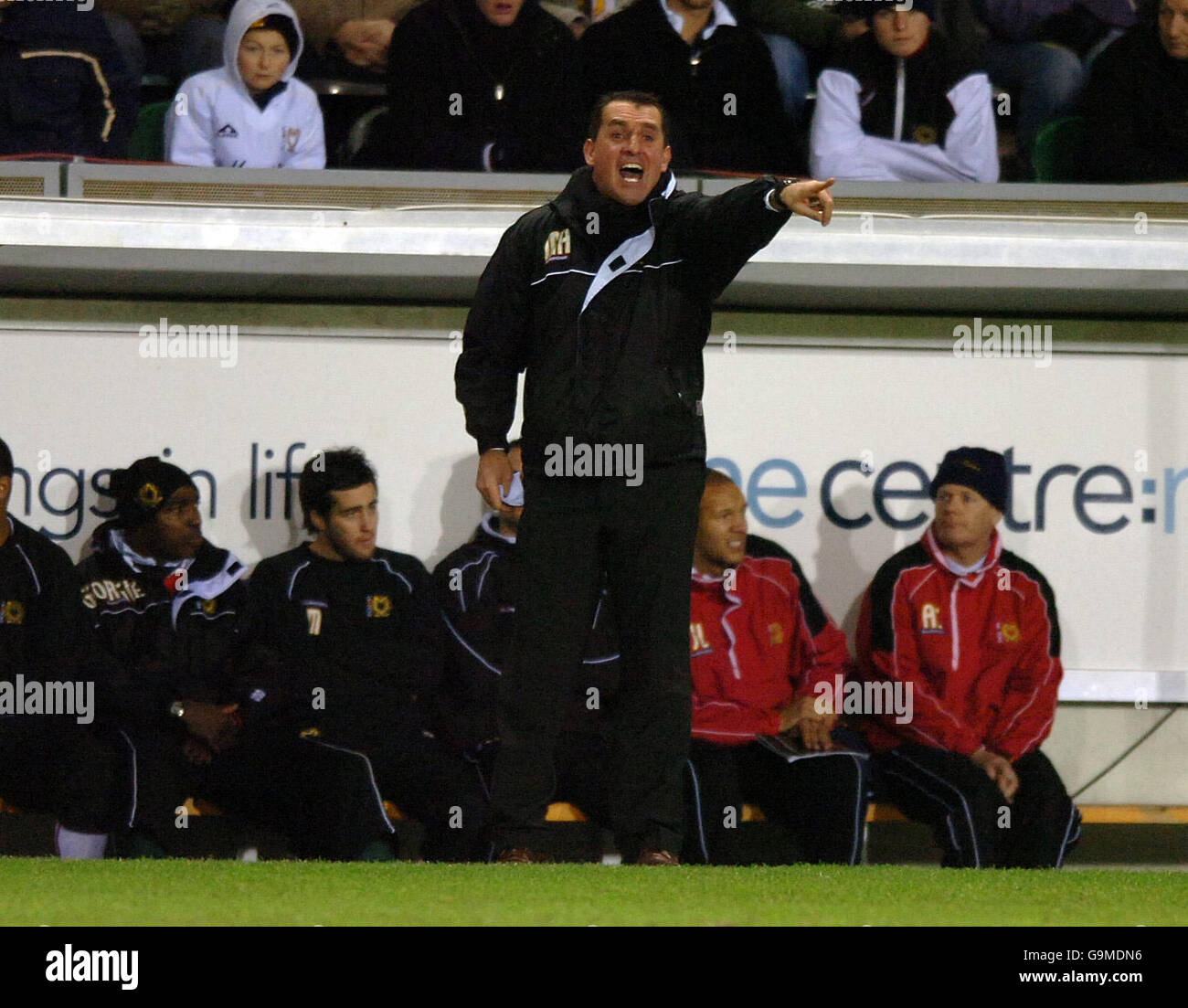 Milton Keynes Dons' manager Martin Allen gives instructions to his players Stock Photo