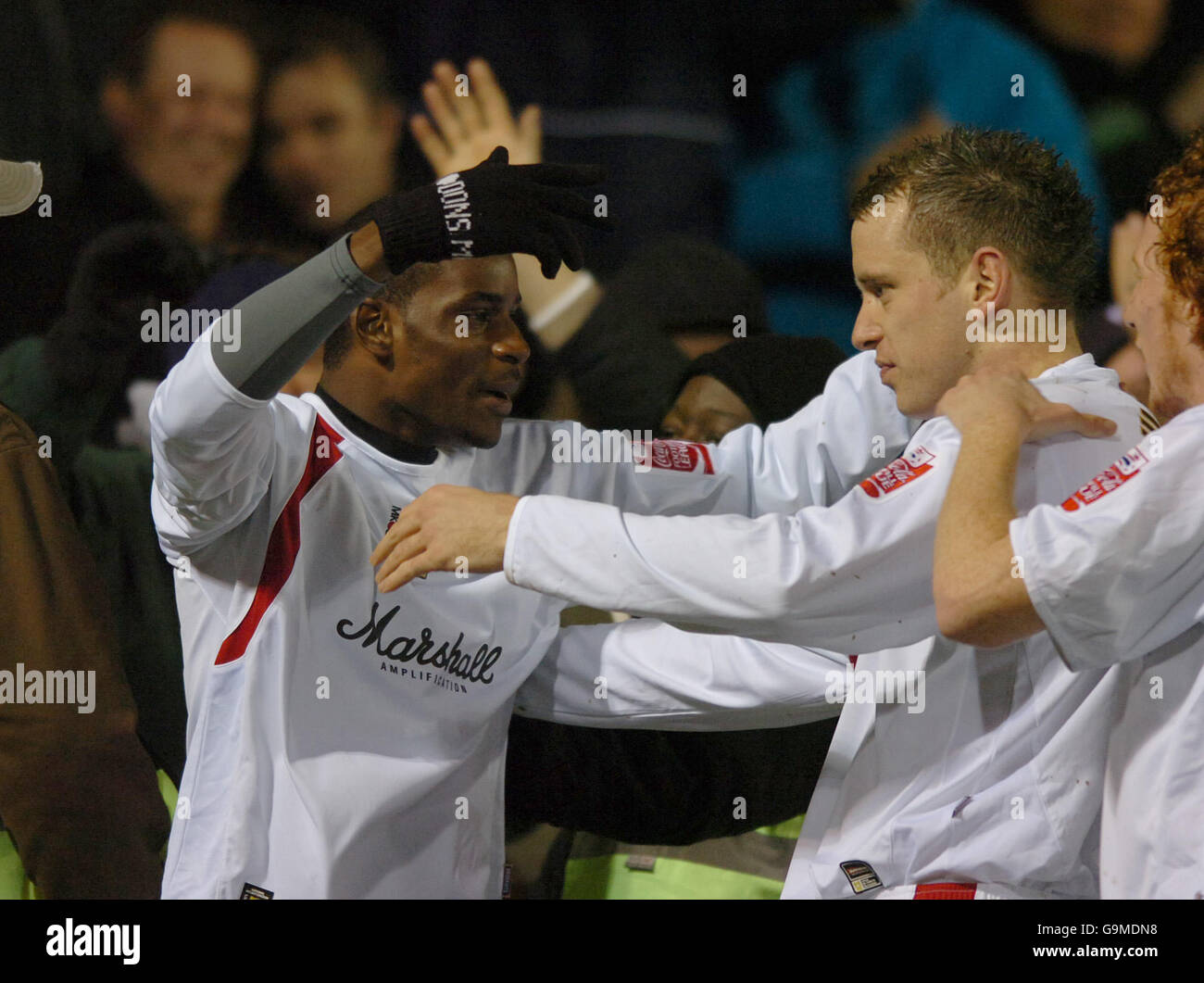 Milton Keynes Dons' izale McLeod celebrates scoring against Lincoln City Stock Photo
