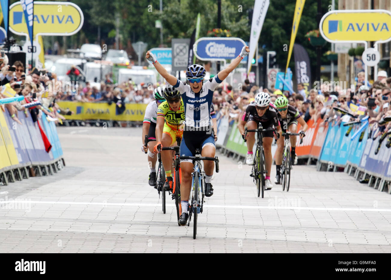Lotta Lepesto, riding for Bigla Pro Cycling Team, crosses the line to win the final stage of Aviva Women's Tour in Kettering Stock Photo