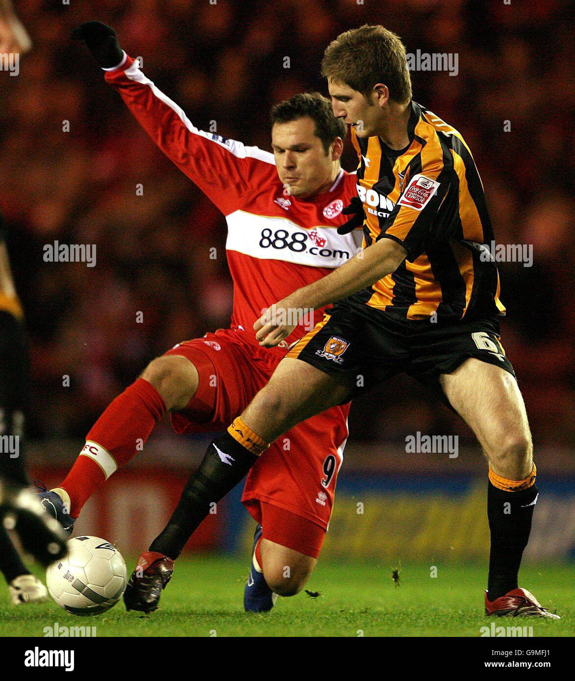 Middlesbrough's Mark Viduka (left) battles with Hull's Nicky Forster ...
