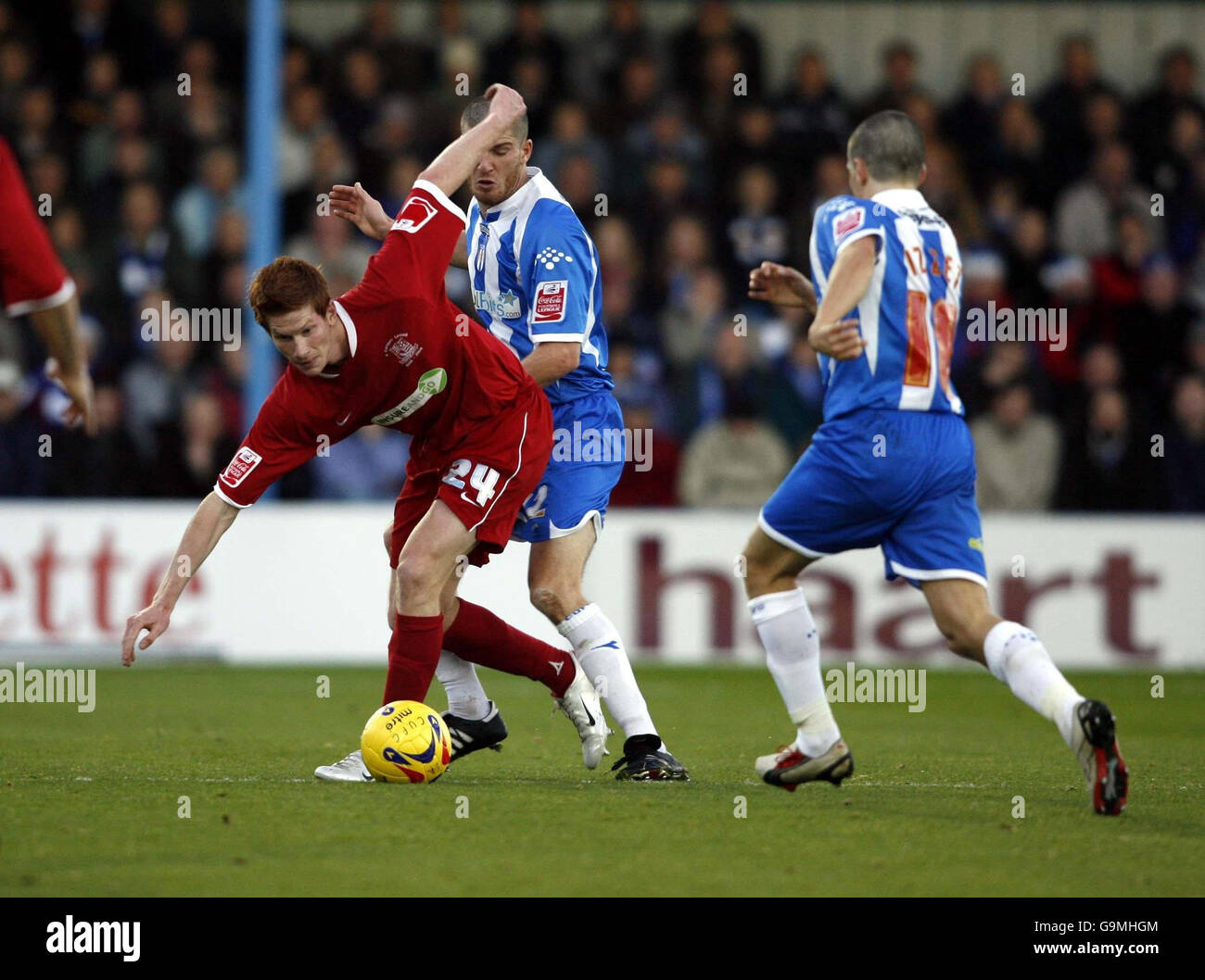 Colchester's Pat Baldwin challenges Southend's Matt Harrold during the Coca-Cola Championship match at Layer Road, Colchester. Stock Photo