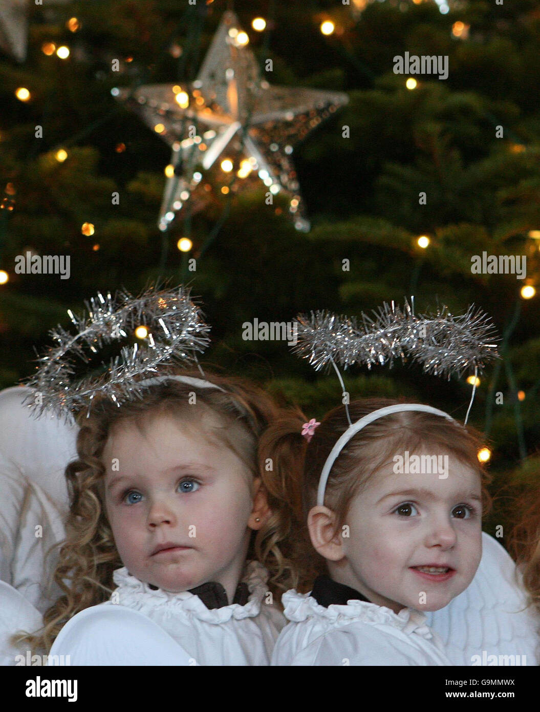 Children from St. Joseph's Nursery in Maryland Dublin sing carols at the blessing of the live animal crib at Mansion House in Dublin. Stock Photo