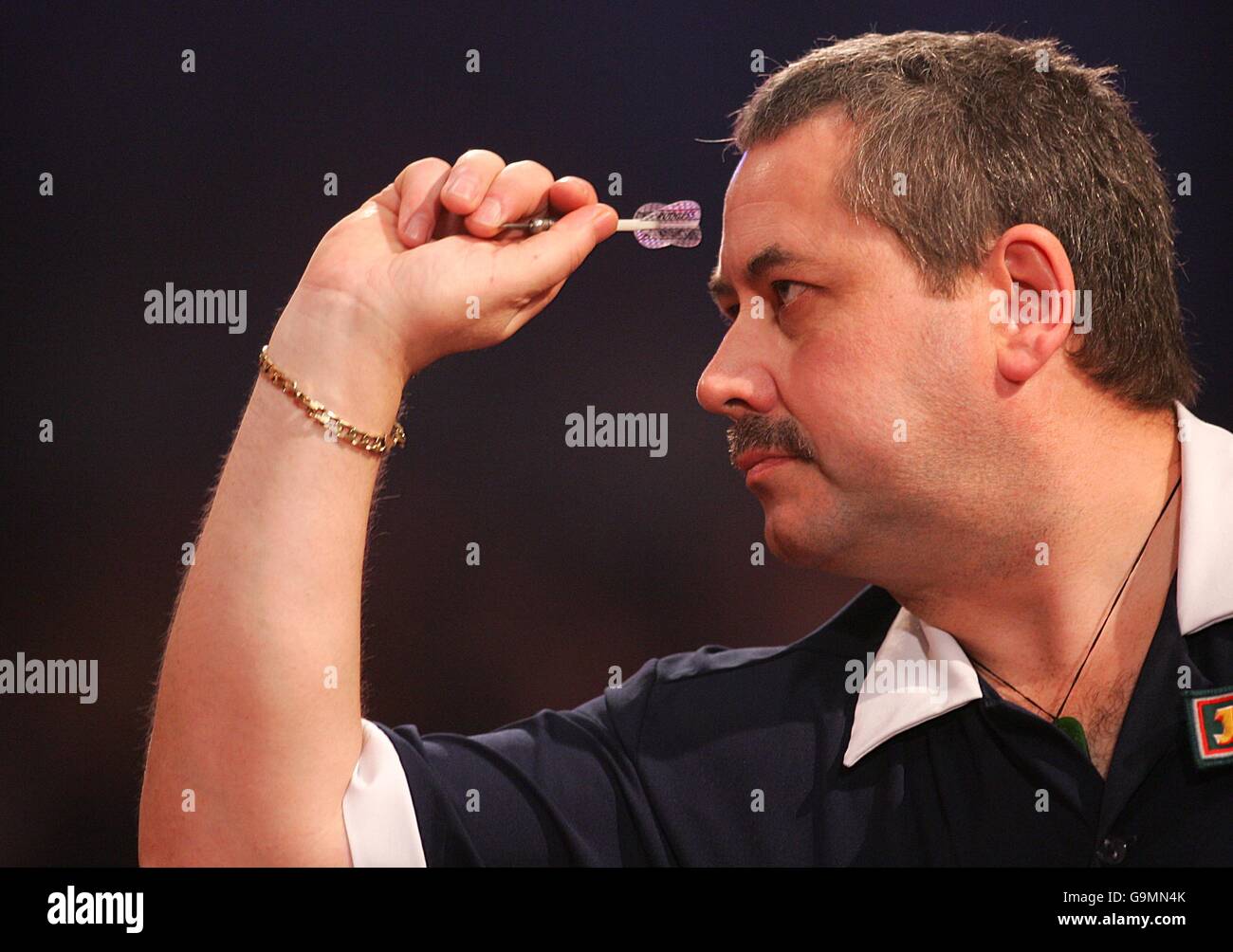 Scotland's Mike Veitch in action against England's Martin Adams during