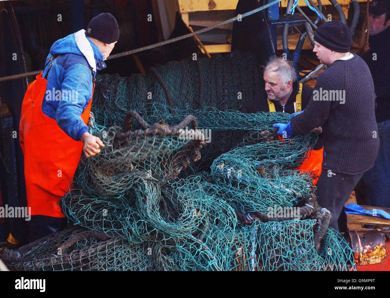 Fisherman work in Pittenweem on the East Coast of Scotland. Stock Photo