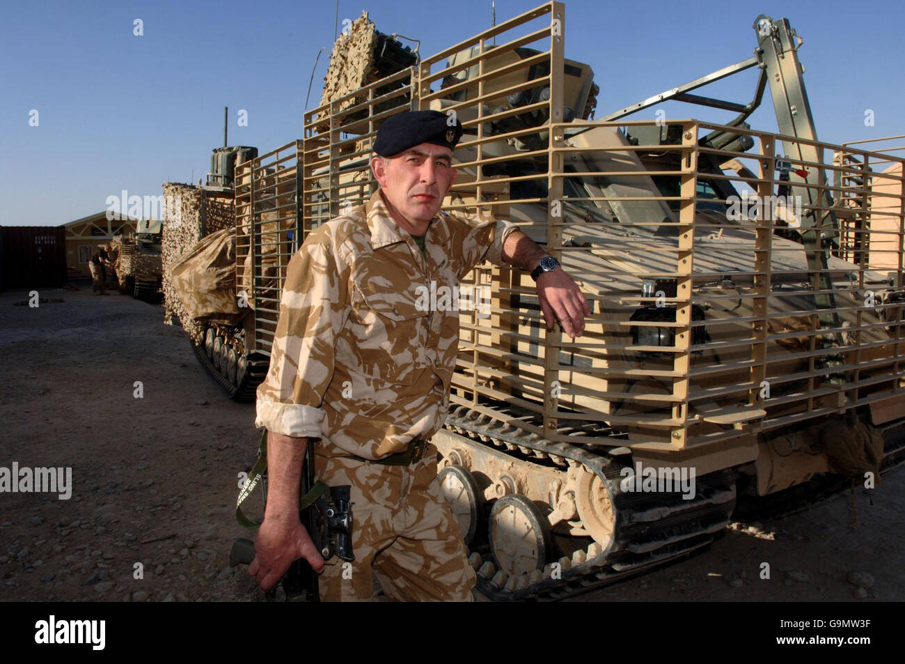 Leading Medical Assistant Allan McNeil, of the Royal Marine Commandos,  stands with a Viking personnel carrier at FOB Price near Gereshk,  Afghanistan Stock Photo - Alamy