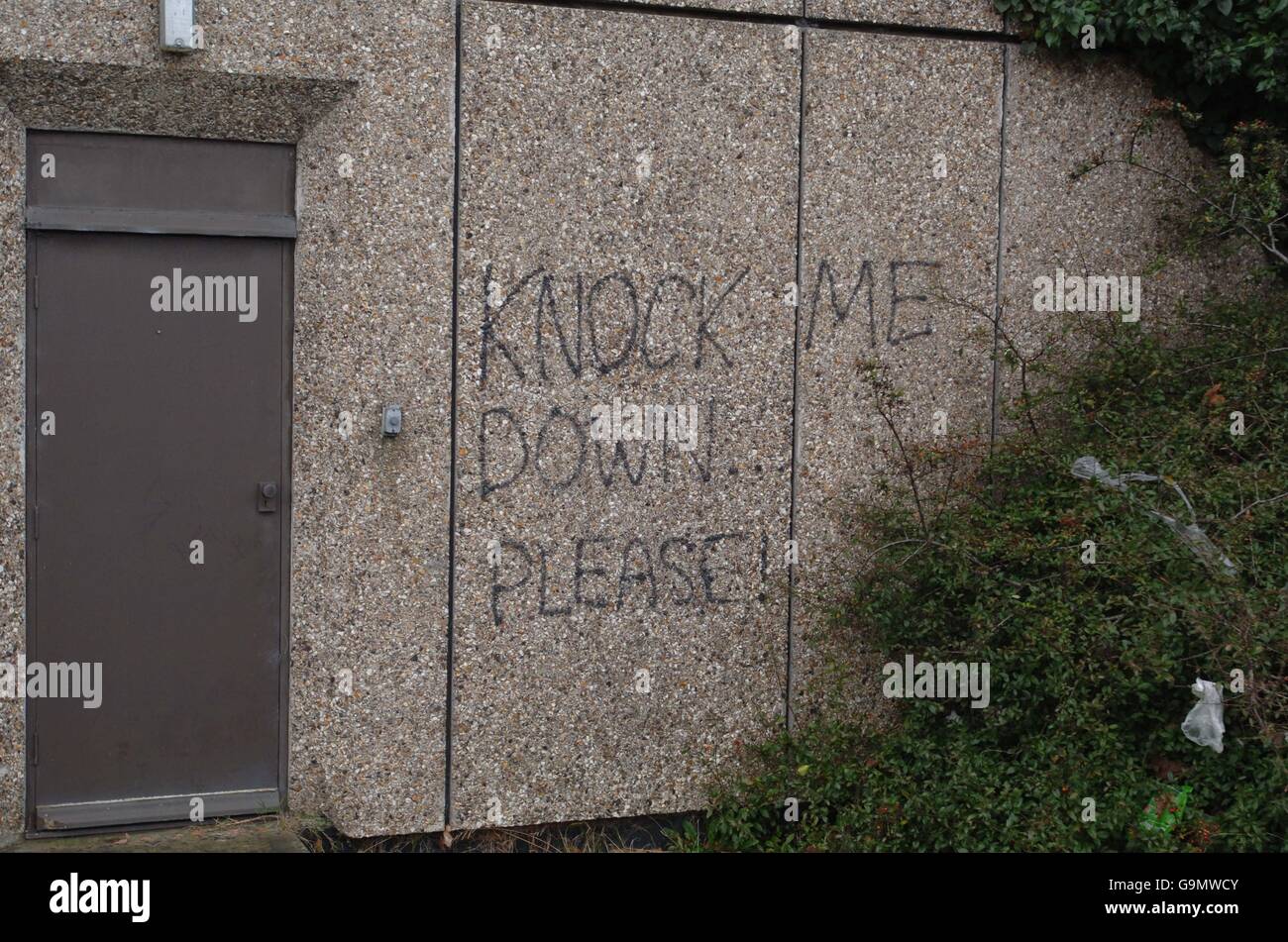 Message on the wall of unused Tricorn House on the outskirts of Stroud, Gloucestershire. Stock Photo