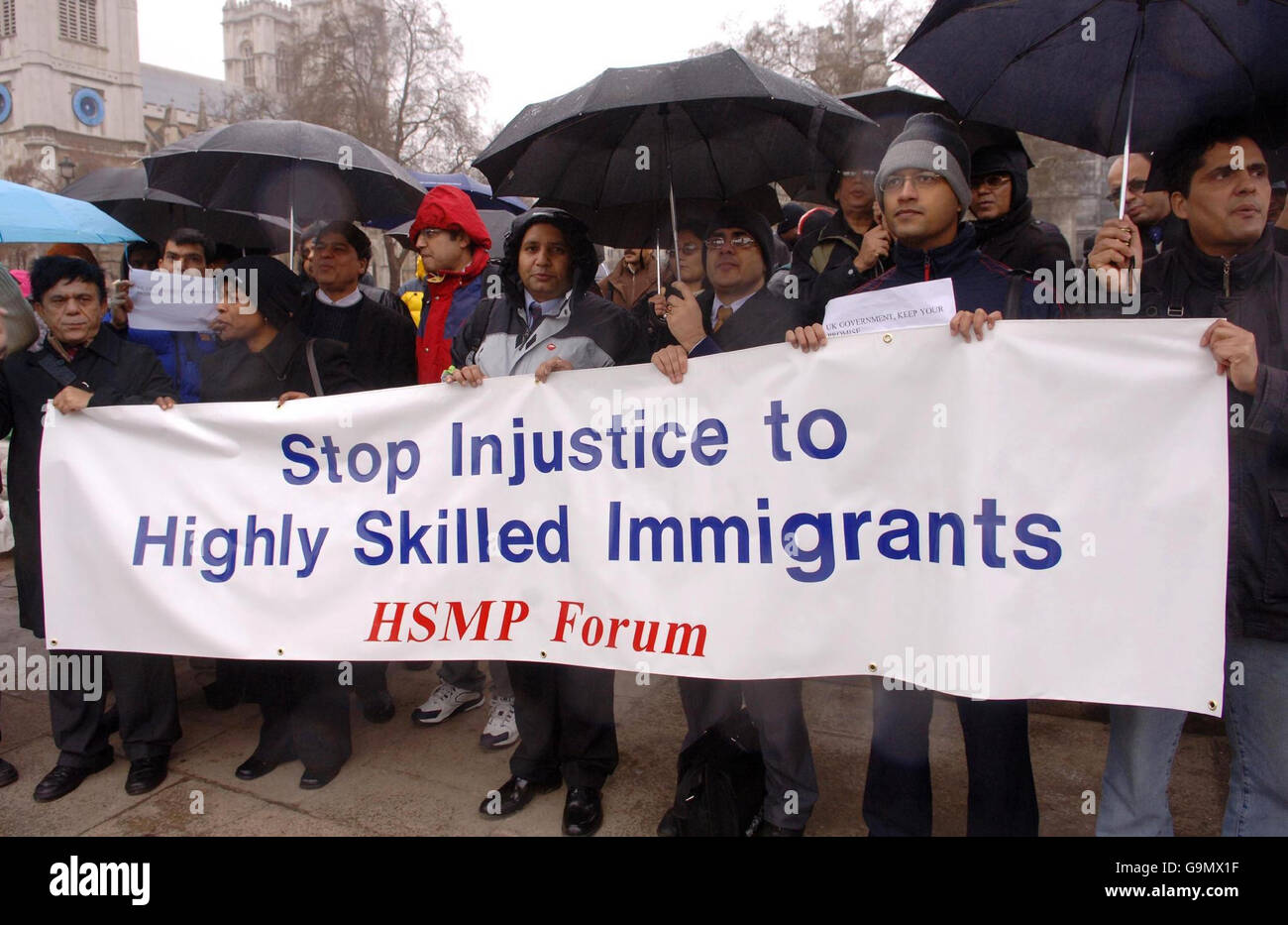 Skilled immigrant workers who were left in the lurch by recent immigration reforms demonstrate outside the House of Commons, London. Stock Photo