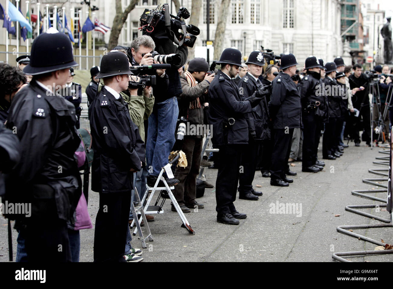 Full length police standing queue uniform mangrk hli hi-res stock ...